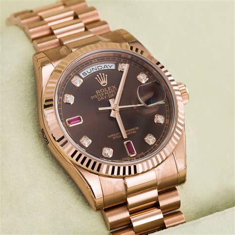 rolex everose gold day date.